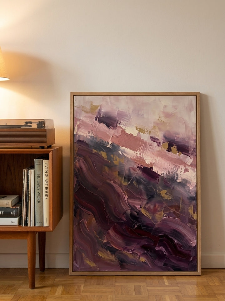 Modern wall art print leaning against the wall in a mid-century home office