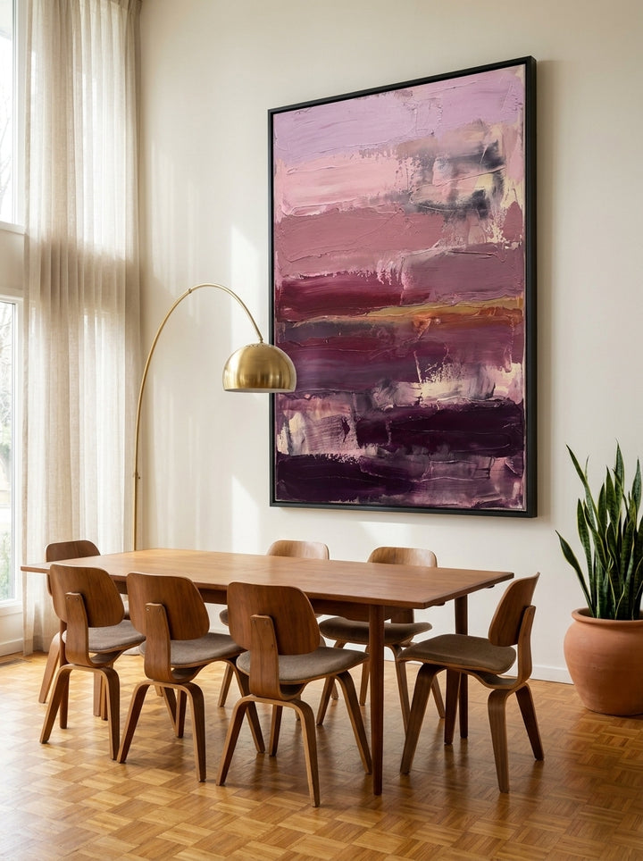 Oversized statement modern wall art print styled on the wall in a mid-century dining room