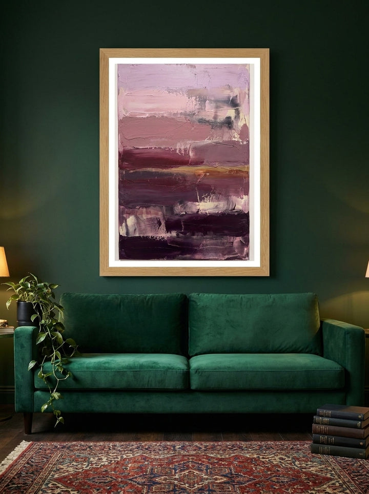 Modern wall art print styled on the wall in a moody living room