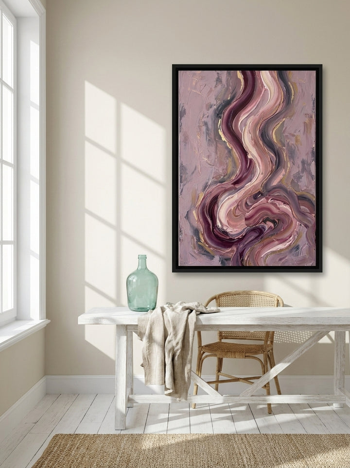 Canvas wall art with a black surround styled on the wall in a coastal home office