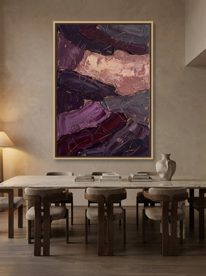 Oversized statement canvas wall art with a natural timber surround styled on the wall in a luxe dining room