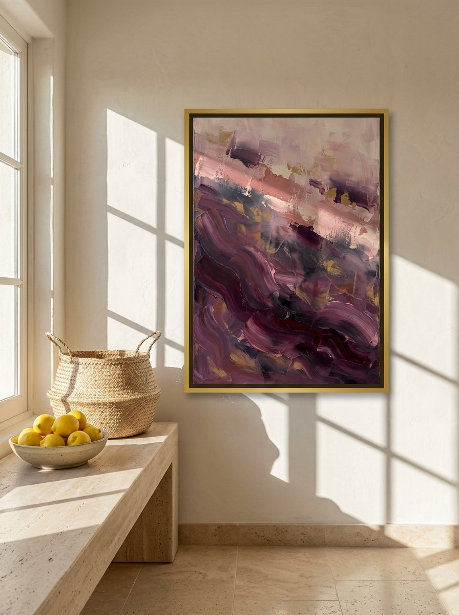 Canvas wall art with a gold leaf surround styled on the wall in a Mediterranean living room
