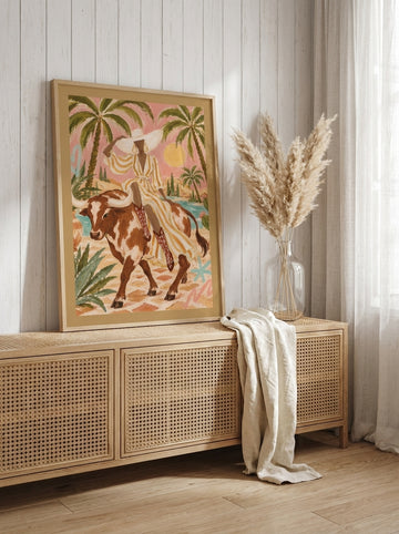 Modern wall art print standing on a sideboard in a coastal home office