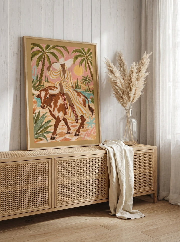 Modern wall art print standing on a sideboard in a coastal home office