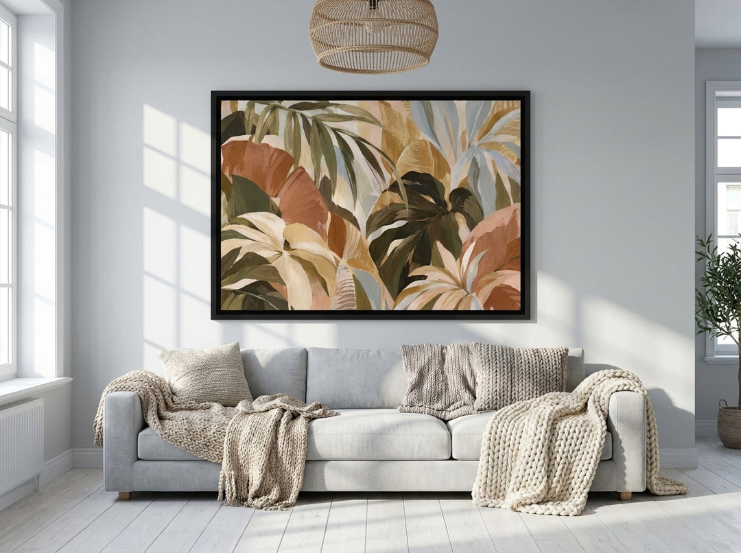 Oversized statement canvas wall art with a black surround styled on the wall in a bright Scandinavian living room