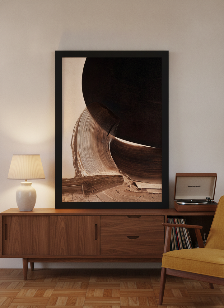 Modern wall art print standing on a sideboard in a mid-century living room