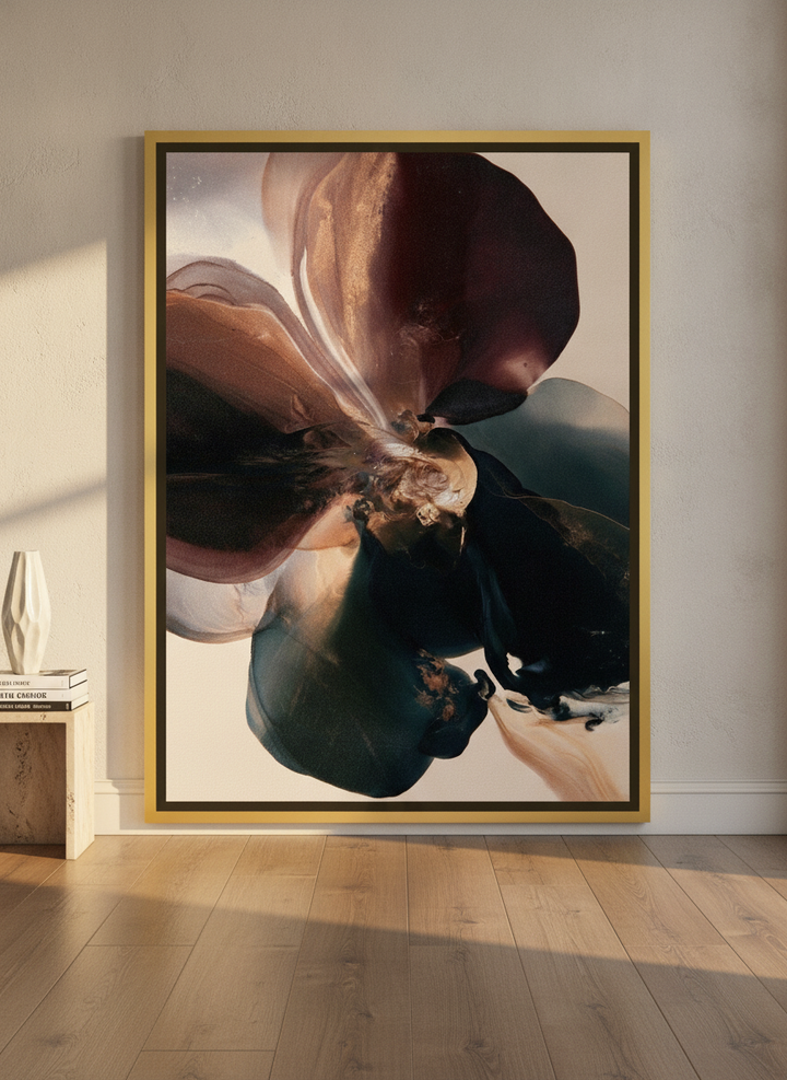 Oversized statement canvas wall art with a gold leaf surround leaning against the wall in a luxe dining room