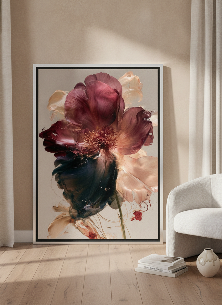 Canvas wall art with a silver leaf surround leaning against the wall in a luxe living room