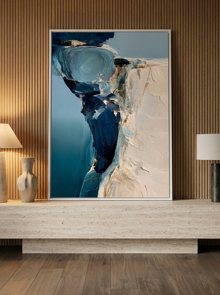 Modern wall art print standing on a console in a luxe home office
