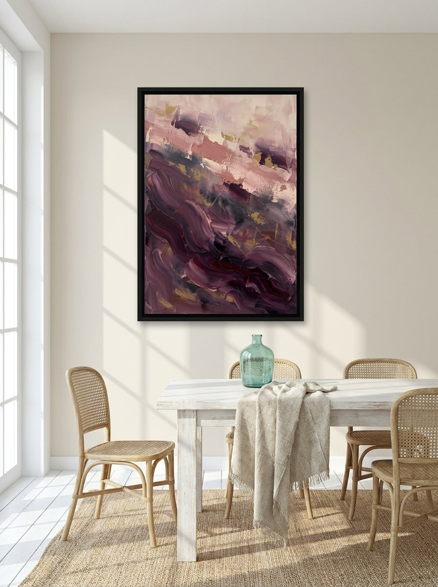 Canvas wall art with a black surround styled on the wall in a coastal dining room