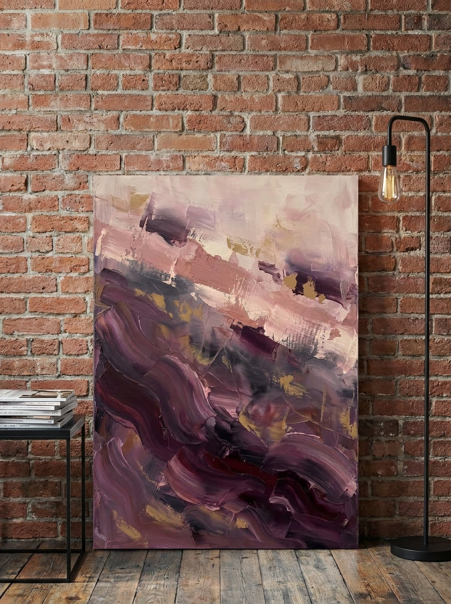 Stretched canvas wall art leaning against the wall in an industrial loft bedroom