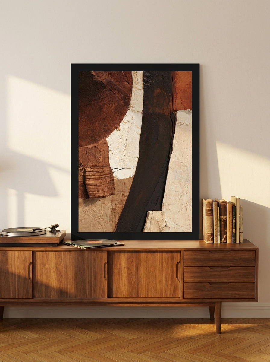 Modern wall art print standing on a sideboard in a mid-century home office