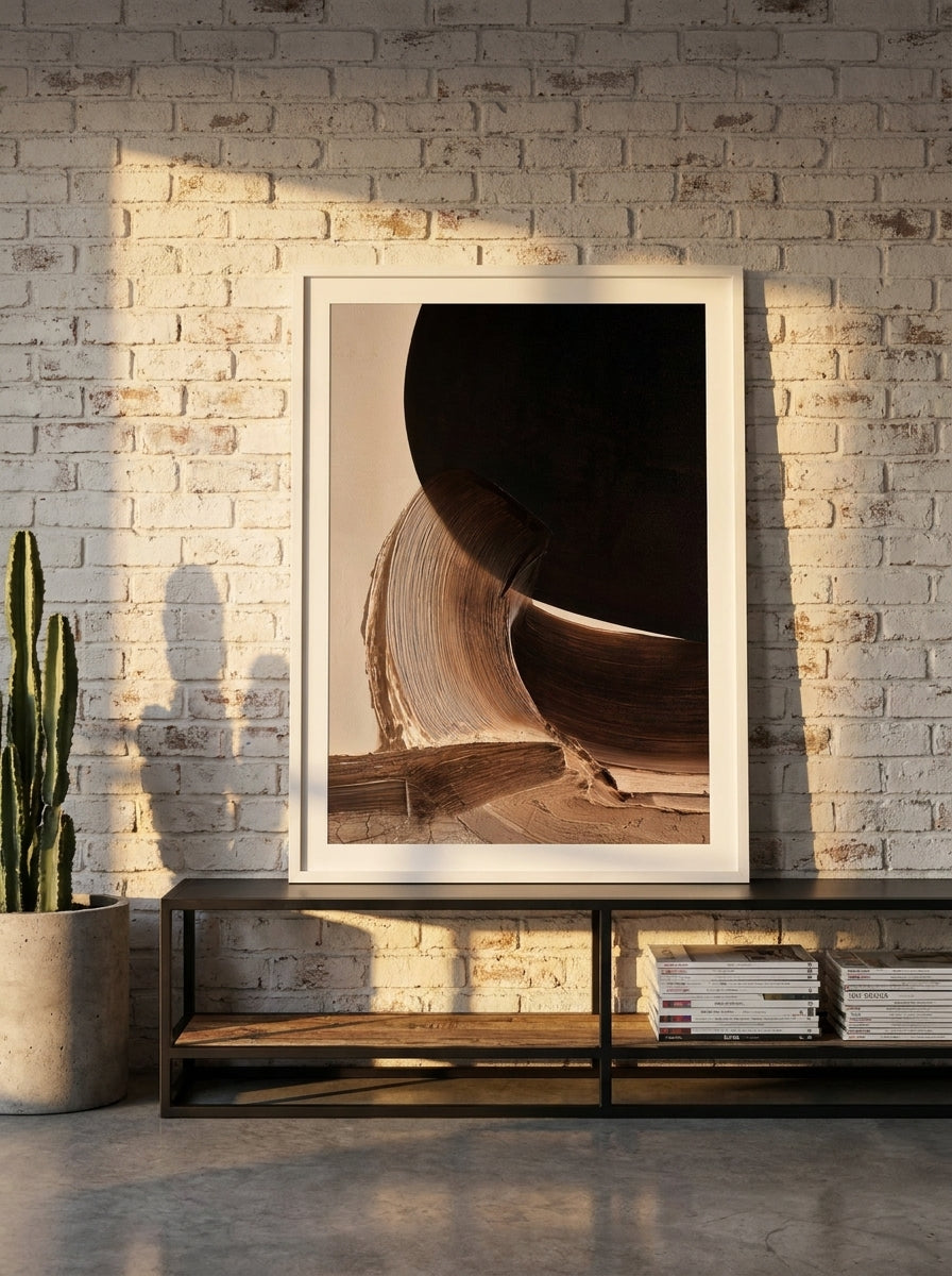 Modern wall art print standing on a console in an industrial loft bedroom