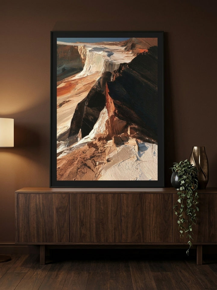 Modern wall art print standing on a sideboard in a moody home office