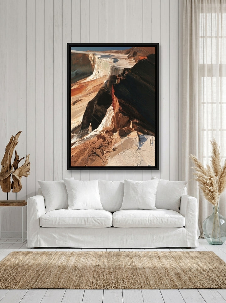 Oversized statement canvas wall art with a black surround styled on the wall in a coastal living room