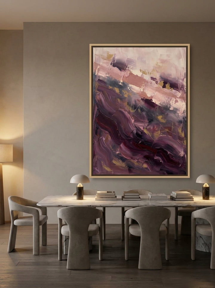 Oversized statement canvas wall art with a natural timber surround styled on the wall in a luxe dining room