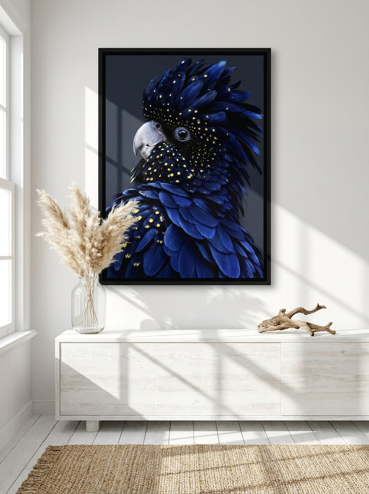 Canvas wall art with a black surround styled on the wall in a coastal living room