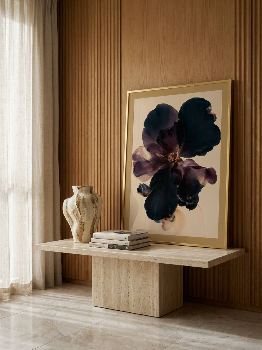 Modern wall art print standing on a console in a luxe bedroom