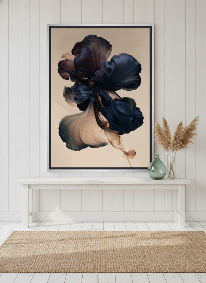 Canvas wall art with a silver leaf surround standing on a console in a coastal bedroom