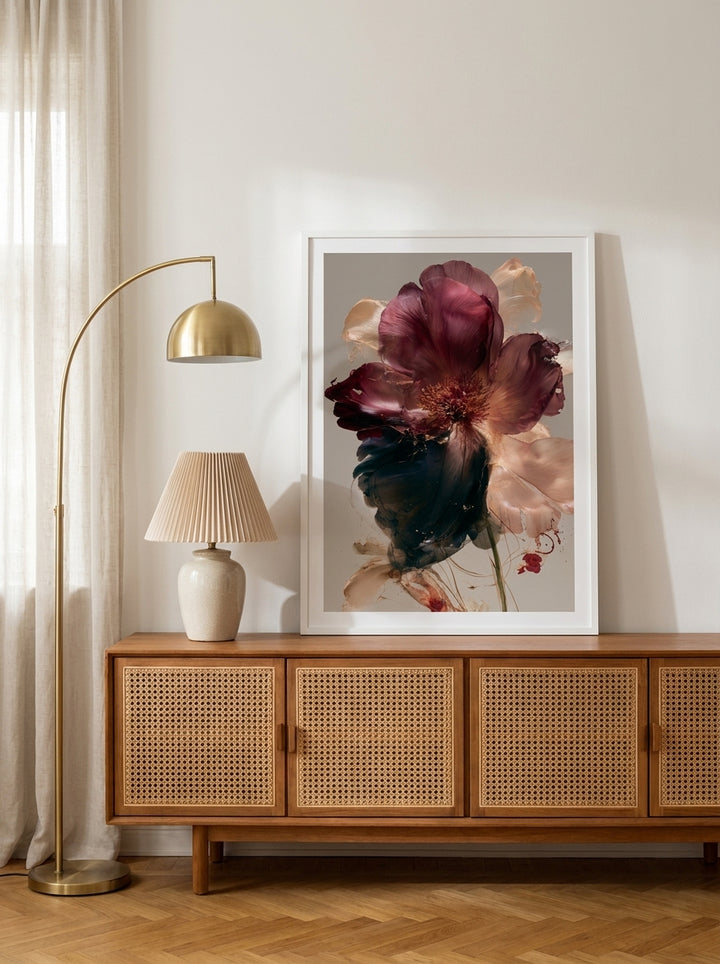 Modern wall art print standing on a sideboard in a mid-century bedroom