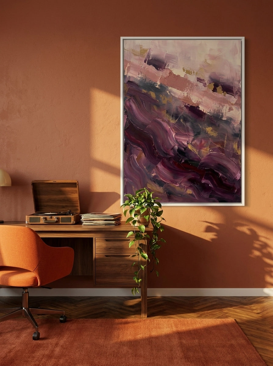 Canvas wall art with a white surround styled on the wall in a retro 70s home office