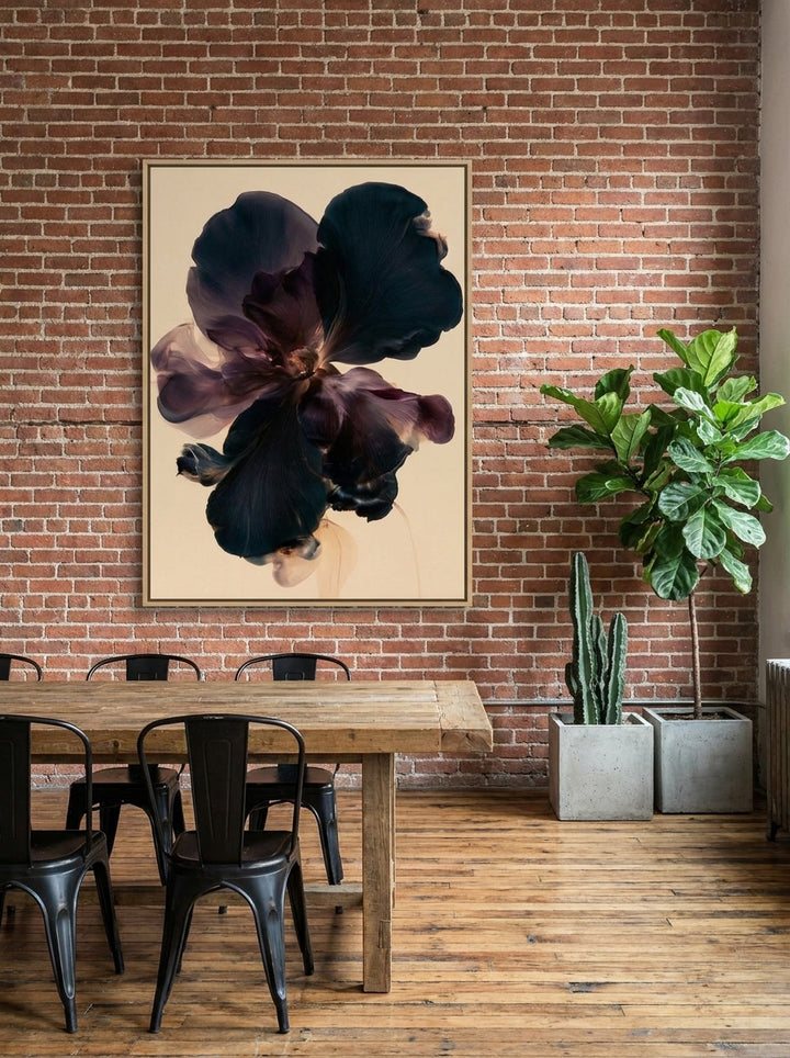 Oversized statement canvas wall art with a natural timber surround styled on the wall in an industrial loft dining room