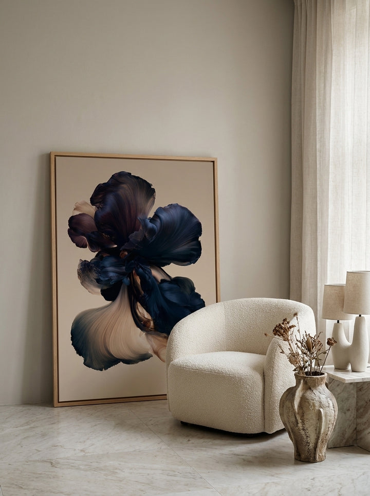 Oversized statement canvas wall art with a natural timber surround leaning against the wall in a luxe bedroom