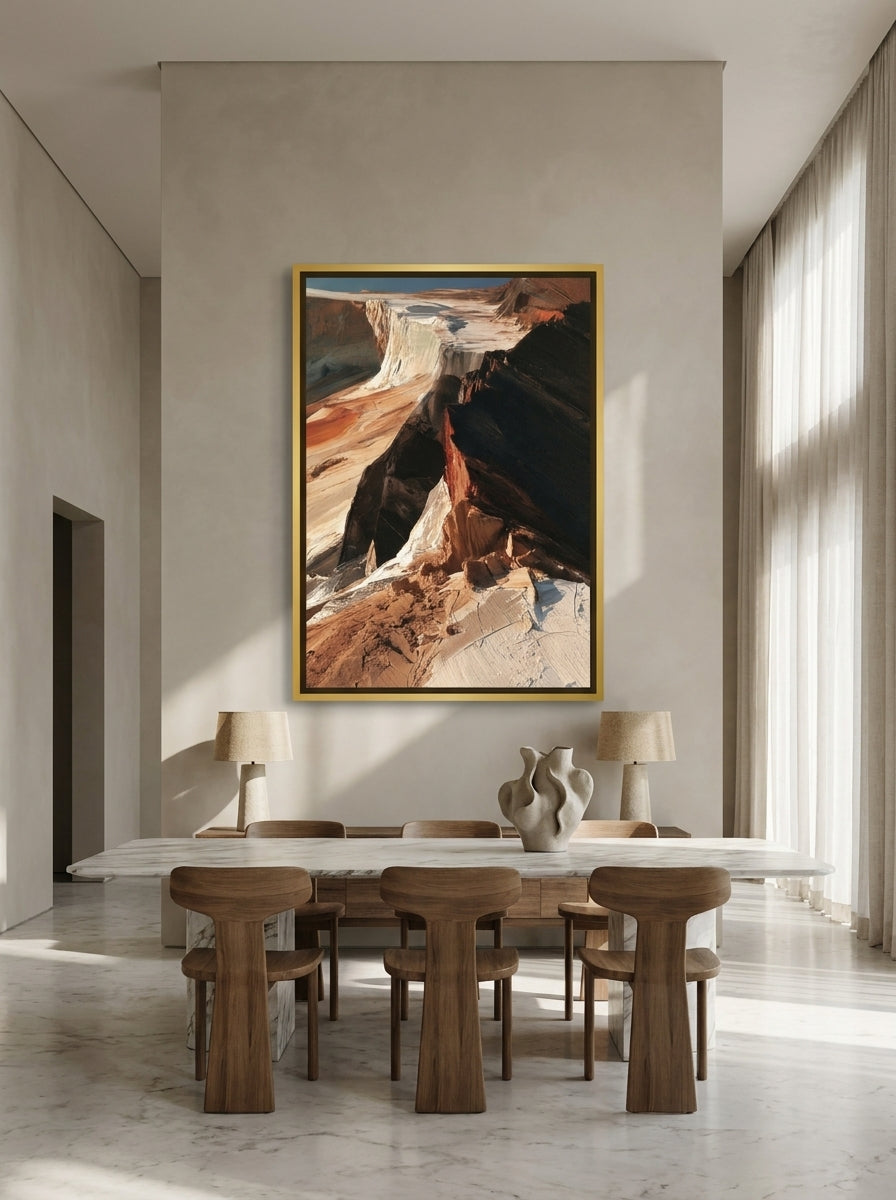 Oversized statement canvas wall art with a gold leaf surround styled on the wall in a luxe dining room