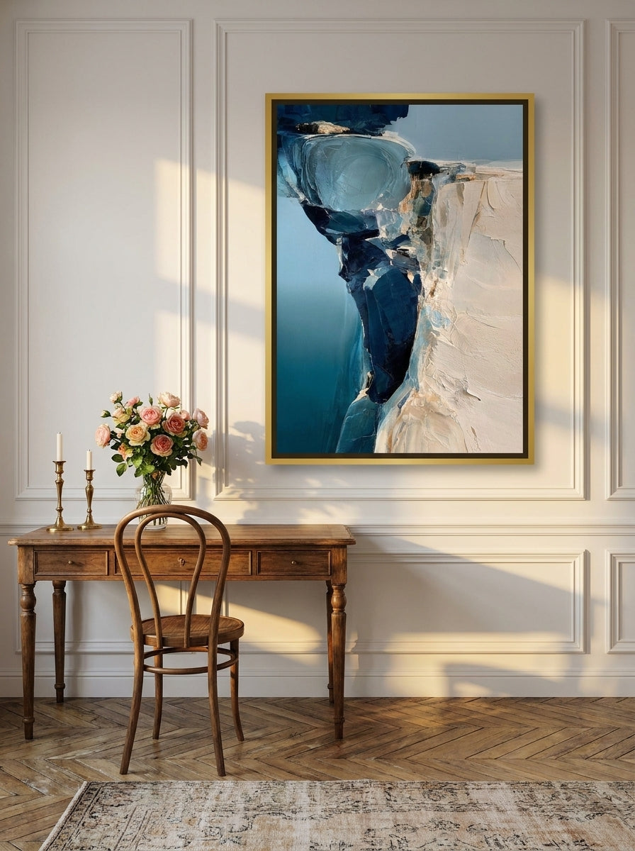 Canvas wall art with a gold leaf surround styled on the wall in a Parisian home office