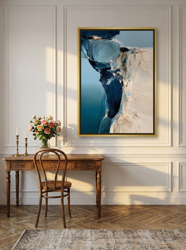 Canvas wall art with a gold leaf surround styled on the wall in a Parisian home office