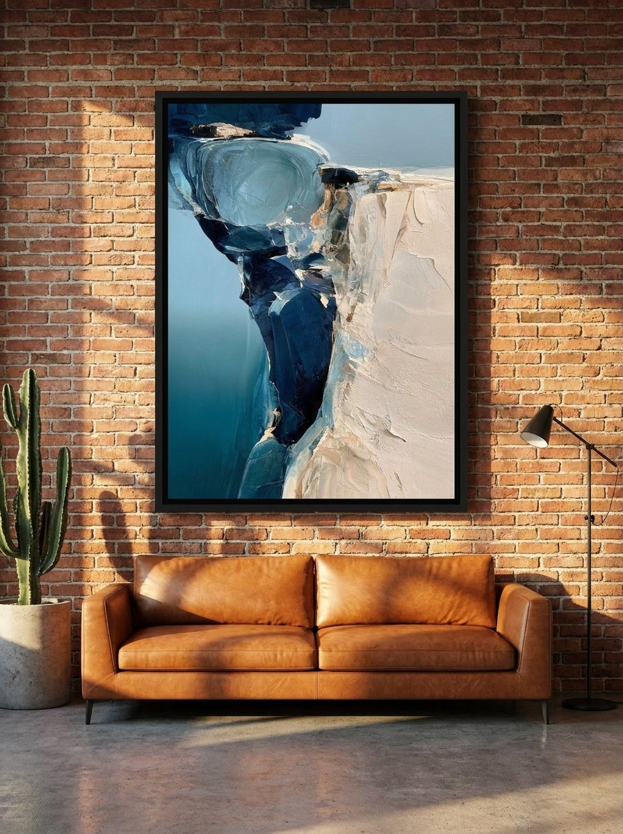Canvas wall art with a black surround styled on the wall in an industrial loft living room