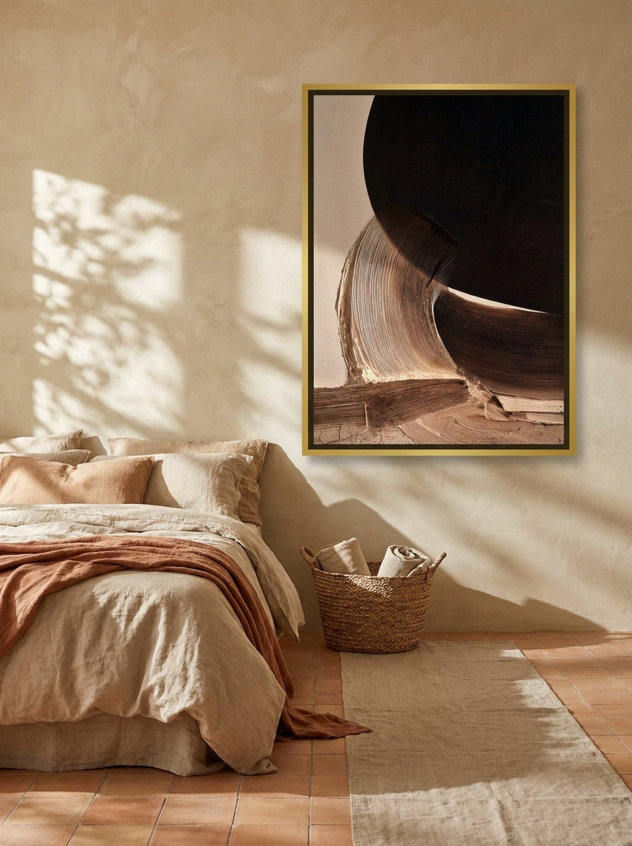Canvas wall art with a gold leaf surround styled on the wall in a Mediterranean bedroom