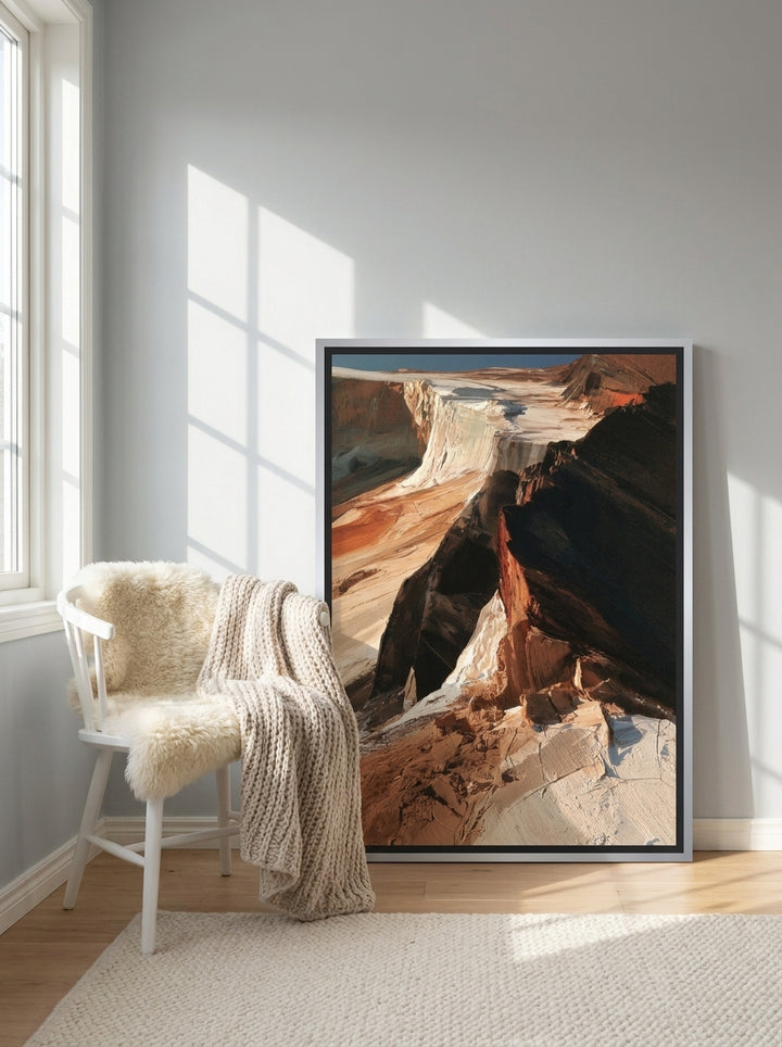 Canvas wall art with a silver leaf surround leaning against the wall in a bright Scandinavian bedroom