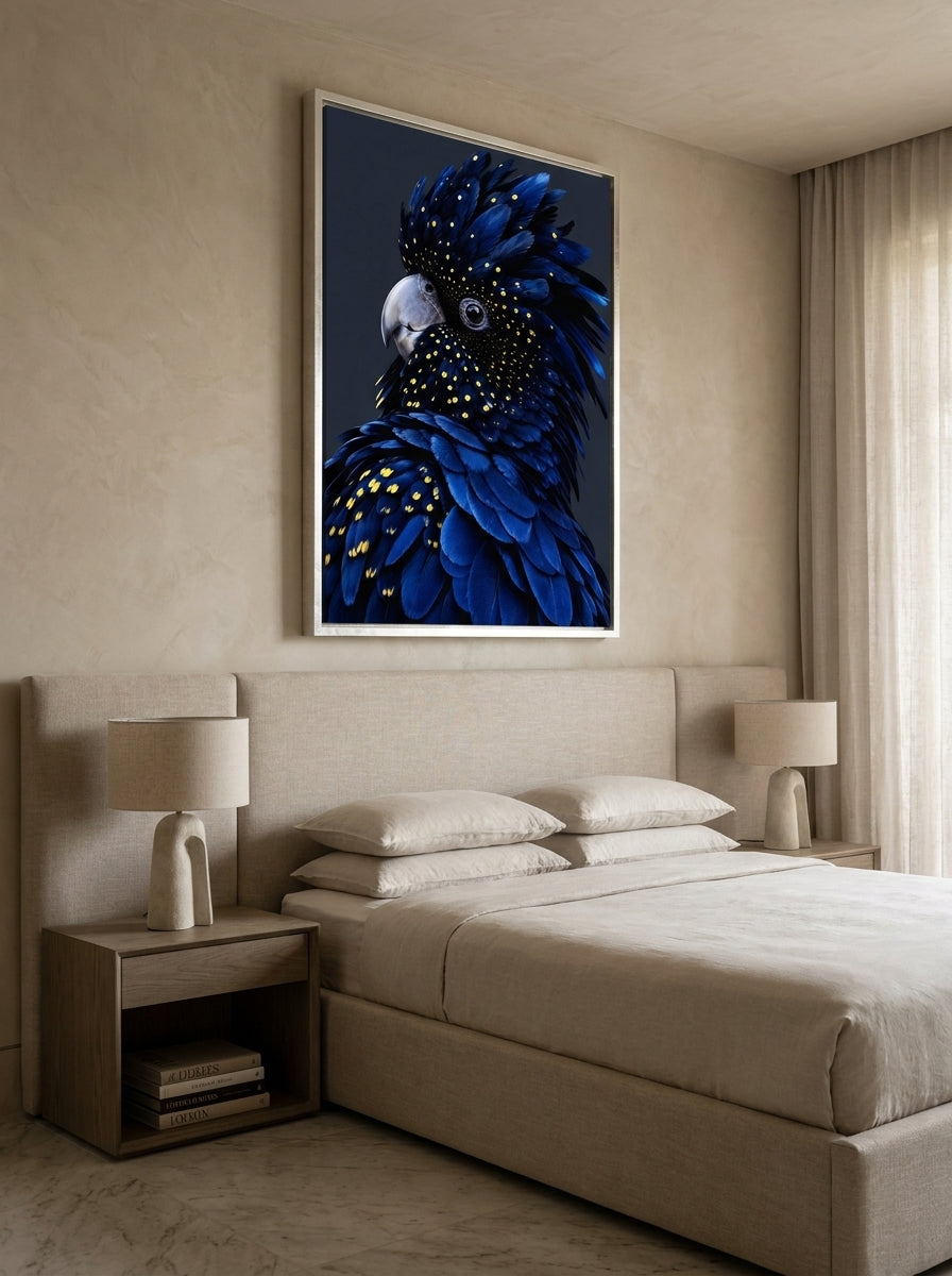 Oversized statement canvas wall art with a silver leaf surround styled on the wall in a luxe bedroom