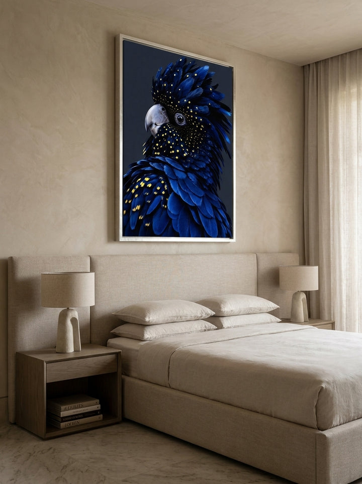 Oversized statement canvas wall art with a silver leaf surround styled on the wall in a luxe bedroom