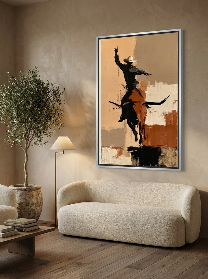 Oversized statement canvas wall art with a silver leaf surround styled on the wall in a luxe living room