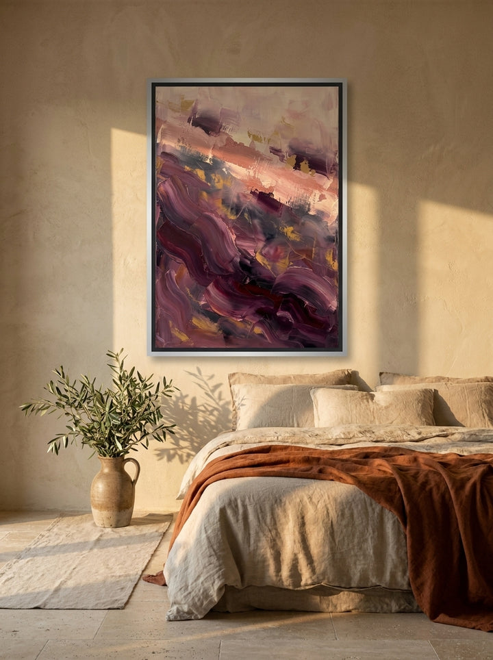 Canvas wall art with a silver leaf surround styled on the wall in a Mediterranean bedroom