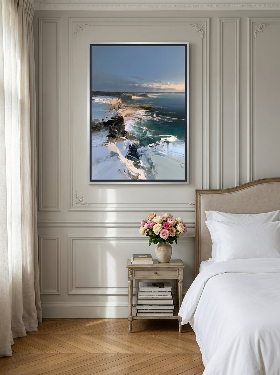 Canvas wall art with a silver leaf surround styled on the wall in a Parisian bedroom