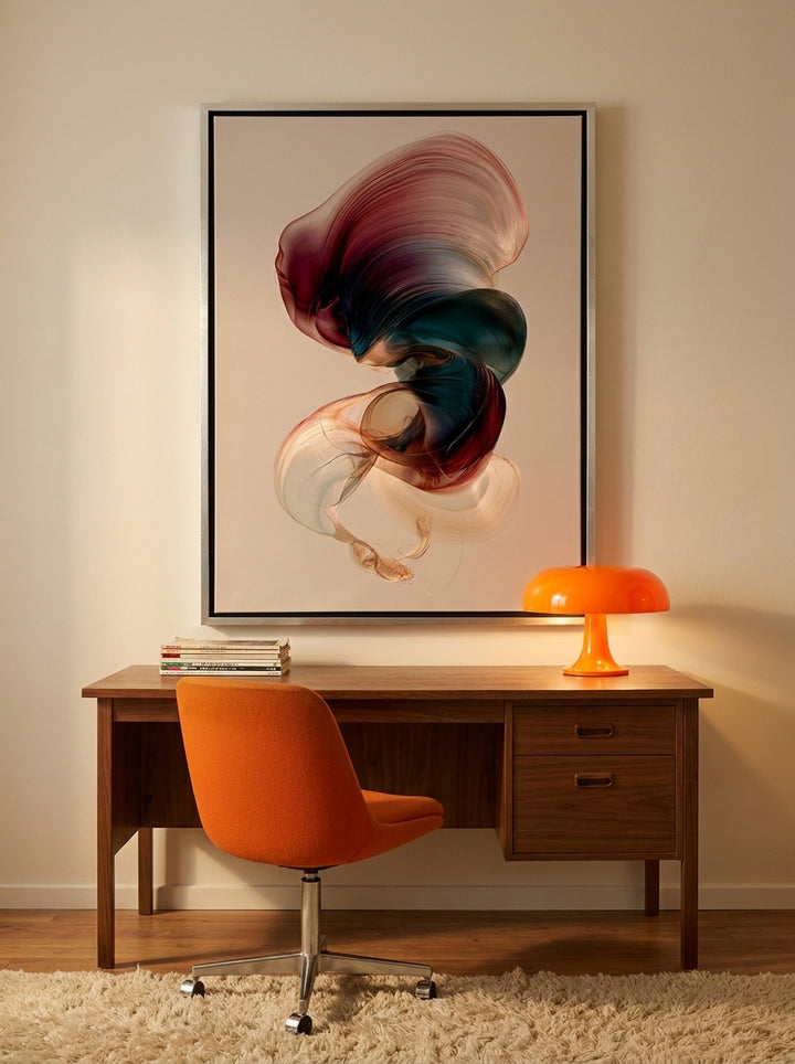Canvas wall art with a silver leaf surround styled on the wall in a retro 70s home office