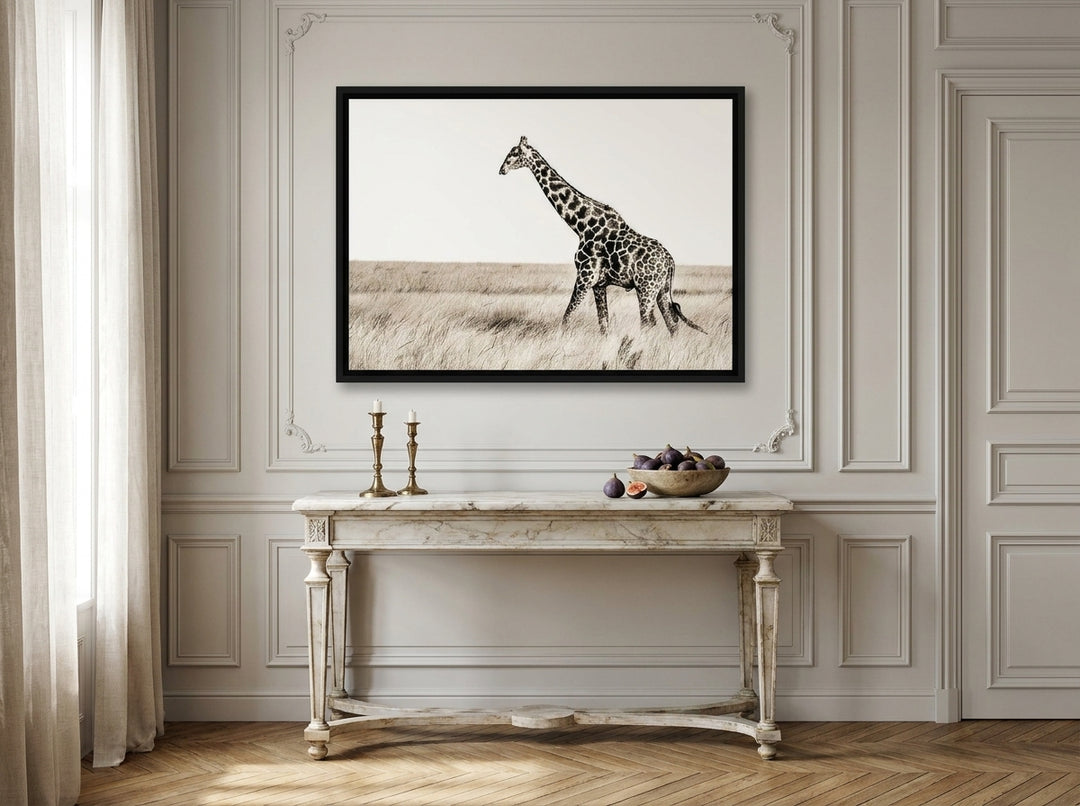 Canvas wall art with a black surround styled on the wall in a Parisian living room