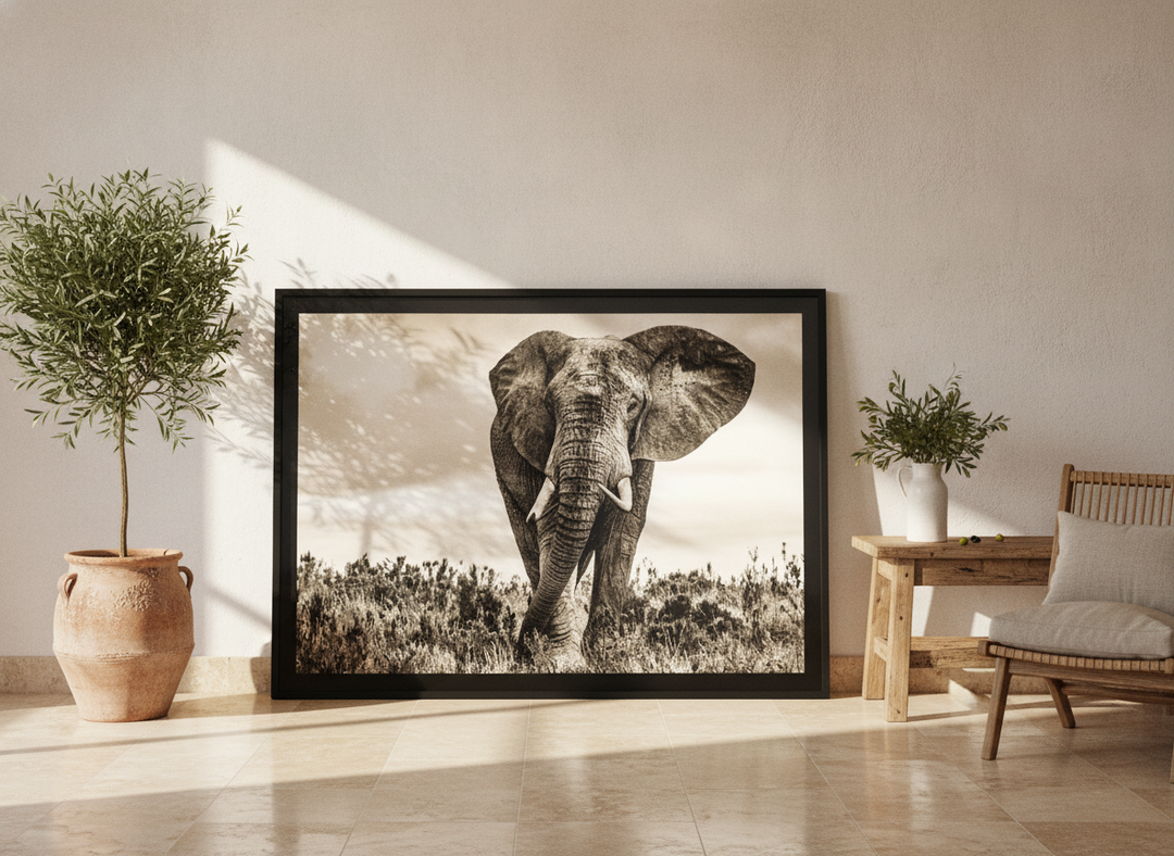 Oversized statement modern wall art print leaning against the wall in a Mediterranean dining room