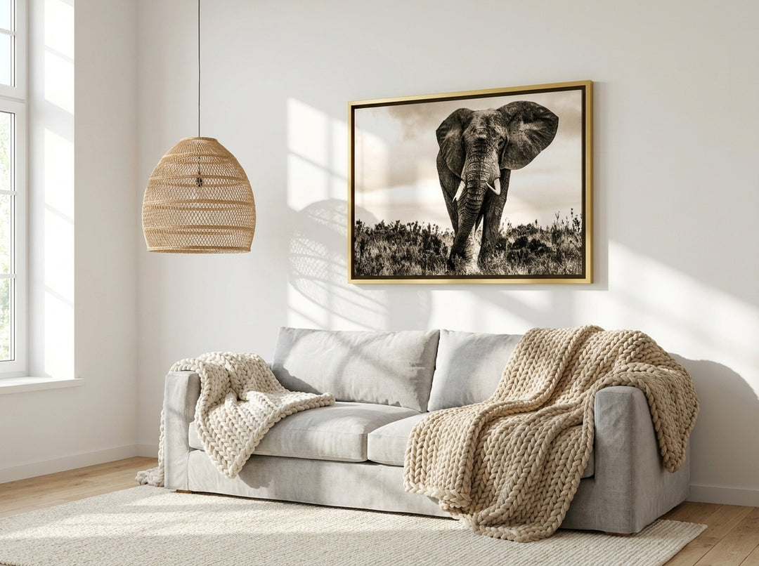 Canvas wall art with a gold leaf surround styled on the wall in a bright Scandinavian living room