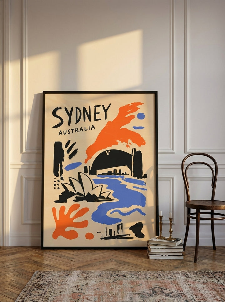 Canvas wall art with a black surround leaning against the wall in a Parisian bedroom