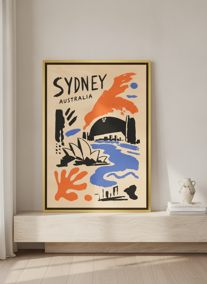 Canvas wall art with a gold leaf surround standing on a console in a luxe living room