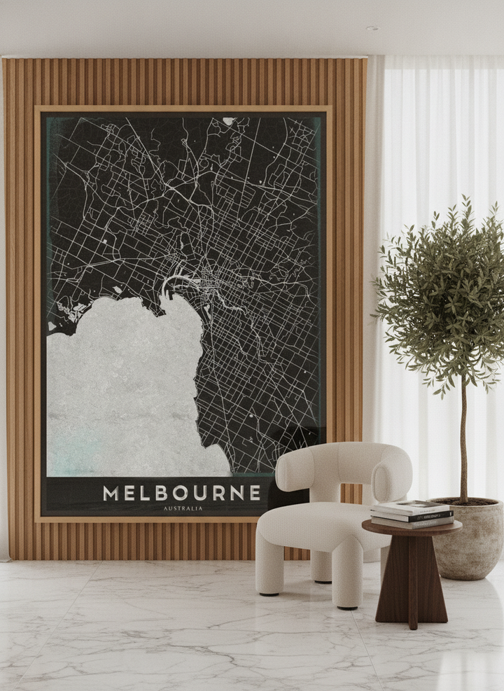 Oversized statement canvas wall art with a natural timber surround leaning against the wall in a luxe dining room