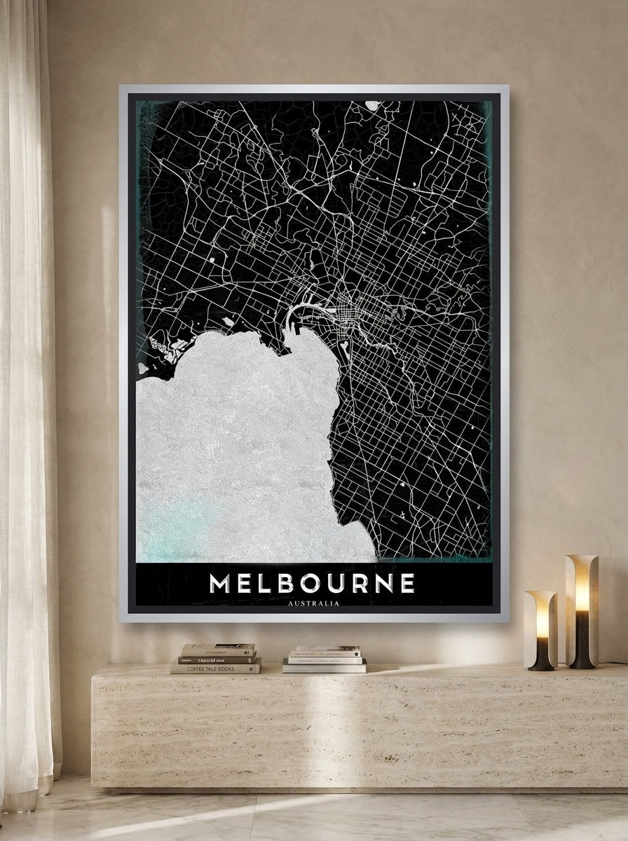 Canvas wall art with a silver leaf surround styled on the wall in a luxe living room