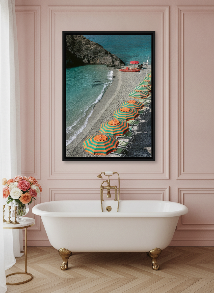 Canvas wall art with a black surround styled on the wall in a Parisian bathroom