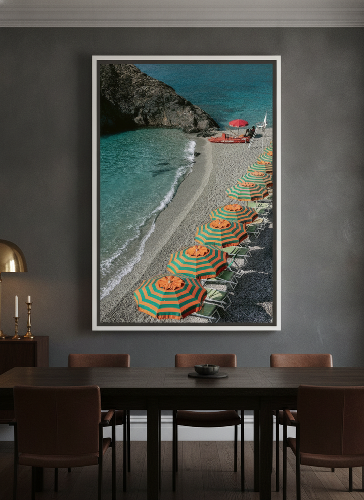 Oversized statement canvas wall art with a white surround styled on the wall in a moody dining room