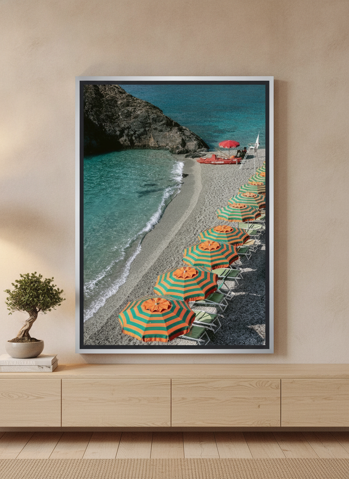 Canvas wall art with a silver leaf surround standing on a sideboard in a warm Japandi bedroom