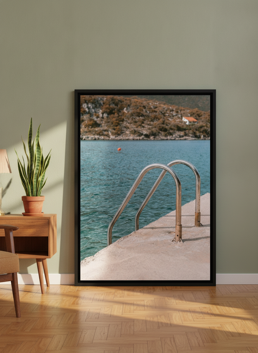 Canvas wall art with a black surround leaning against the wall in a mid-century bedroom